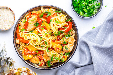 Stir fryed egg noodles with chicken, fresh pineapple, paprika, green onion, ginger, garlic, soy...
