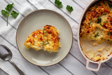 Homemade Scalloped Potatoes with Cheese and Parley, top view.