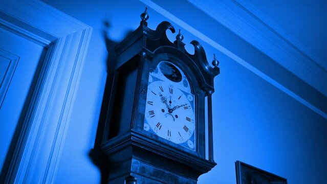 Hallway Is Lit Up With Lightning Strikes Over Grandfather Clock