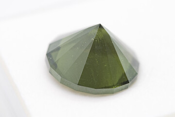 Vltava, or moldavite, is a precious stone, a natural green colored glass with a surface structure...