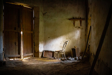 Fototapeta na wymiar Interior of old abandoned rustic house