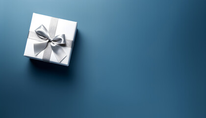 White gift box with silver ribbon on blue background. Top view. Copy space for text. Generative AI.