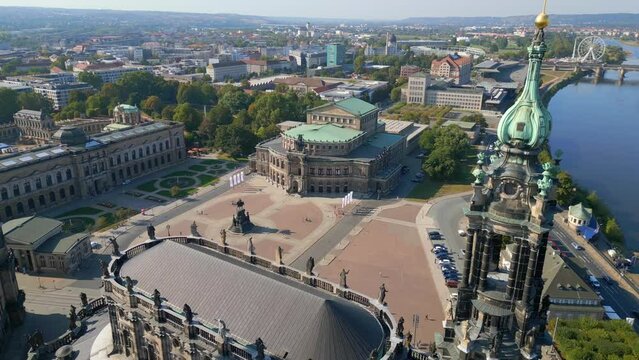 Zwinger, Opera Church at River City Dresden. Dramatic aerial view flight drone