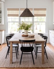 Black chairs and wood table in a modern dining room