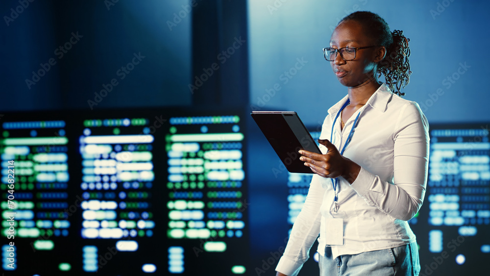 Poster african american woman walking through data center systems providing processing resources for differ