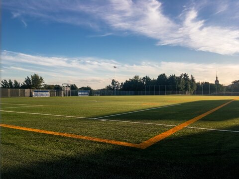 Brand new football pitch at beautiful sunset
