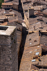 Wide panoramic view over downtown San Gimignano, Torre Ficarelli in the center, seen from Torre Grosso