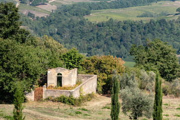 A small derelict cemetery near the Cellole monastery in the beautiful landscape of the Tuscany