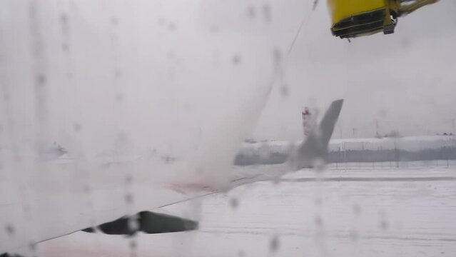 Airplane deicing. Deicing fluid mixture of a chemical sprayed under pressure to remove ice and snow on the aircraft.