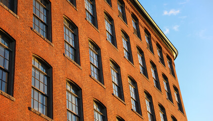 urban brick building, symbolizing stability and growth in commercial real estate