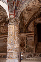 Wall frescoes of rich decorated courtyard of Palazzo Vecchio in Florence