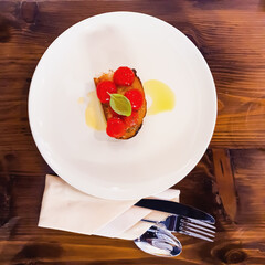 Italian Appetizer tomato on bread with fresh olive oil