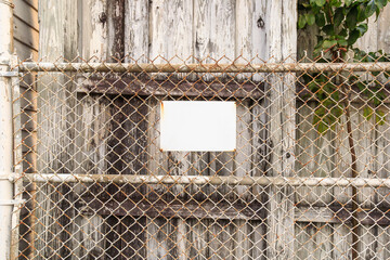 Sign on fence