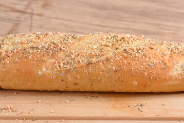 Baked wheat bread with herb seasoning seasoned baguette
