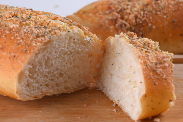 Baked wheat bread with herb seasoning seasoned baguette