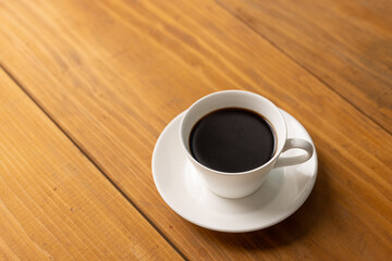 Cup of hot coffee on a table,