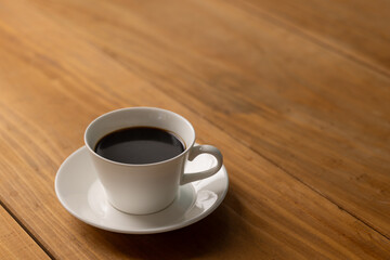 Cup of hot coffee on a table,
