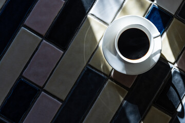 Cup of hot coffee on a table,