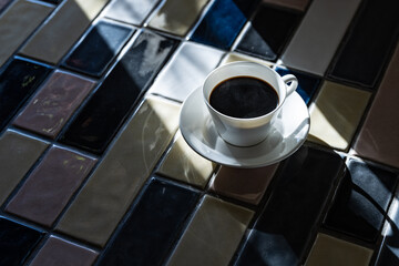 Cup of hot coffee on a table,