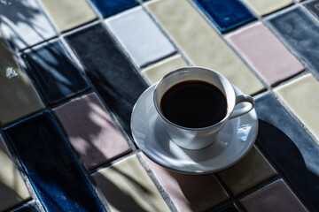 Cup of hot coffee on a table,