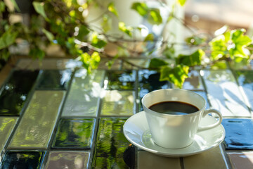 Cup of hot coffee on a table,