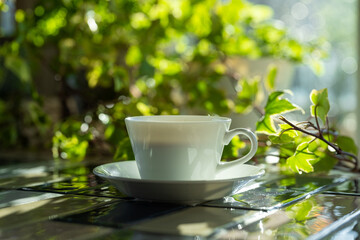 Cup of hot coffee on a table,