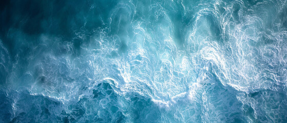 Fototapeta premium Aerial Perspective of Turbulent Aquamarine Ocean Waves Creating a Textured Marine Tapestry