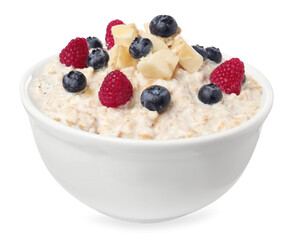 Tasty boiled oatmeal with berries and banana in bowl isolated on white
