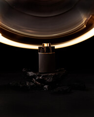 Perfume mock up in black on a gold light background