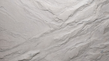 Textured gray stone surface, perfect for backgrounds or design projects requiring a rough stone appearance