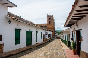 Barichara, Santander, Colombia. Historic village with old buildings, cobblestone streets, and sky. Colonial houses and streets