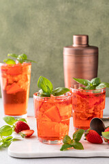Strawberry basil spring cocktail in a tall glass