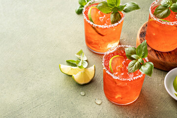 Strawberry basil margarita with lime, refreshing spring cocktail