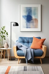Blue armchair with orange pillow and blue throw blanket in living room