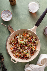 Corned beef hash with potatoes and carrots