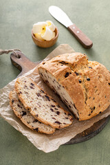 Irish soda bread sliced on a board, traditional recipe