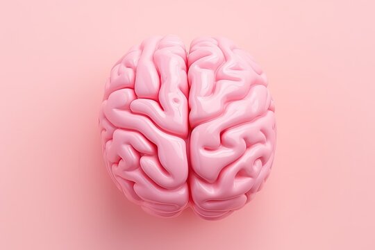 Close up of a pink background featuring a human brain model symbolizing neurosurgery and healthcare
