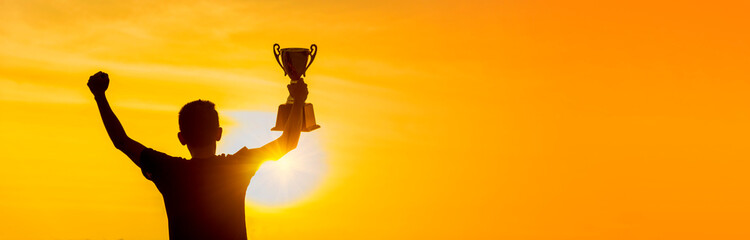 Banner Winner win hands holding golden champion trophy cup prize. Silhouette best award victory...