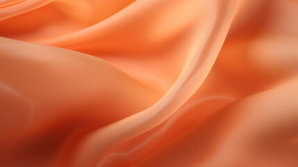 Fototapeta premium Soft peach satin fabric captured in a moment of graceful flow, highlighting its luxurious sheen and elegant texture.