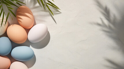 A modern Easter arrangement with pastel eggs and the shadow of palm leaves cast on a smooth, neutral backdrop. - obrazy, fototapety, plakaty