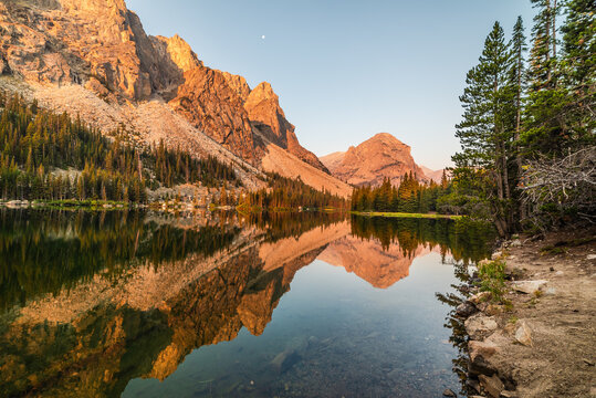 Sunrise Glow On Rugged Mountains