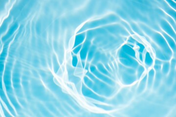  Bluewater waves on the surface ripples blurred. Defocus blurred transparent blue colored clear calm water surface texture with splash and bubbles. Water waves with shining pattern texture background.