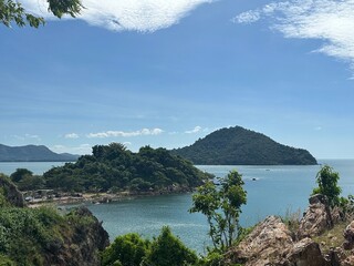 Wind whispers through rugged peaks, endless blue beckons from dizzying heights. This vista ignites the explorer's spirit, a call to conquer, discover, and embrace the beauty of nature