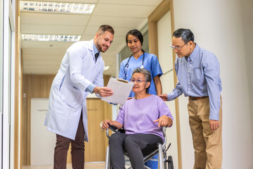 Fototapeta premium Man doctor with stethoscope service help support discussing and consulting care talk to sick senior asian woman patient in hospital,caregiver,elderly,recovery,illness insurance.healthcare and medicine