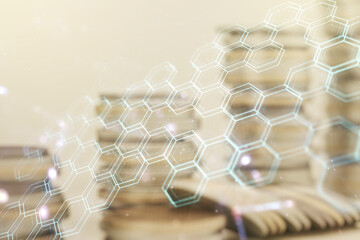 Double exposure of abstract virtual technology hologram with hexagon on growing stacks of coins...