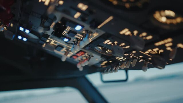 Airplane Cockpit for Aviation Pilot and Plane Navigation of Pilotage. One Hand of Aviator Using Electronic Computer Equipment in Flight Cabin Close Up. Man of Fly Industry Piloting Flying Aeroplane