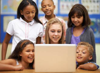 Children, students and computer in classroom for education, learning and video streaming with group...