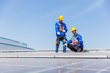 Technicians are installation and inspection standards of solar panels on roof of an industrial factory. Electrical energy obtained from nature sunlight clean renewable energy. engineer tests.