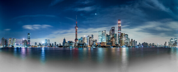 Shanghai city skyline and modern commercial buildings scenery at night. Famous financial district...