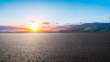 Asphalt road and green mountain with sky clouds nature landscape at sunset. panoramic view.
